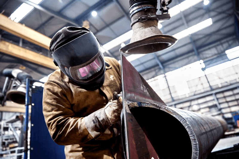 Welder working on a steel assembly in Esbjerg